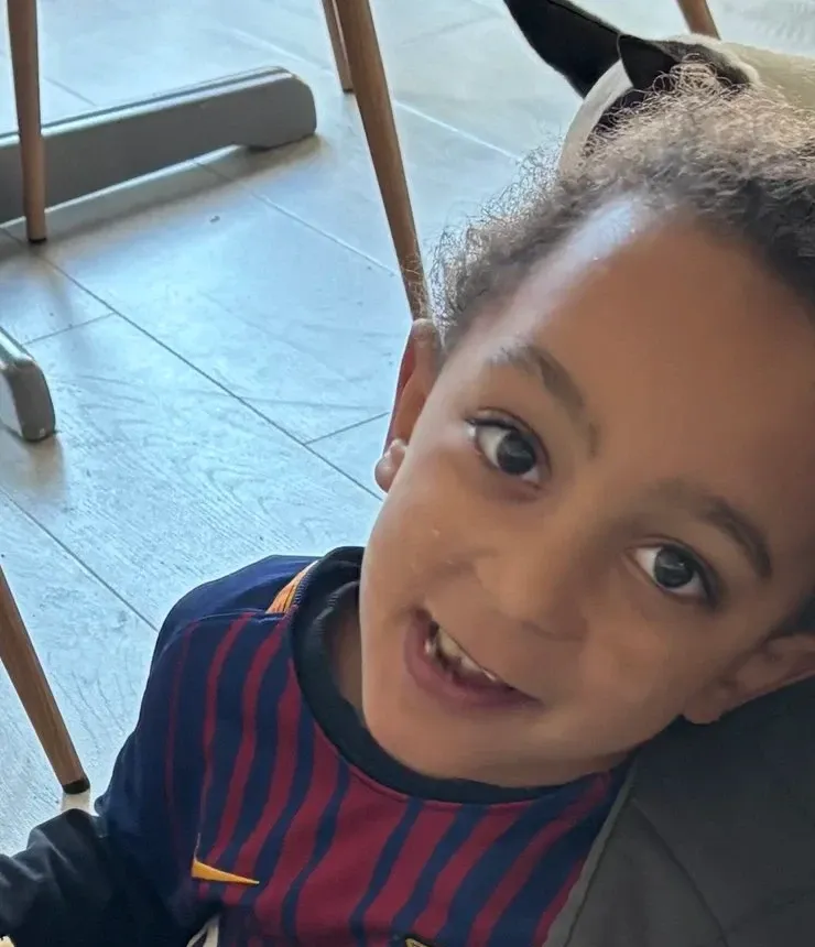 Martí smiling in his football shirt